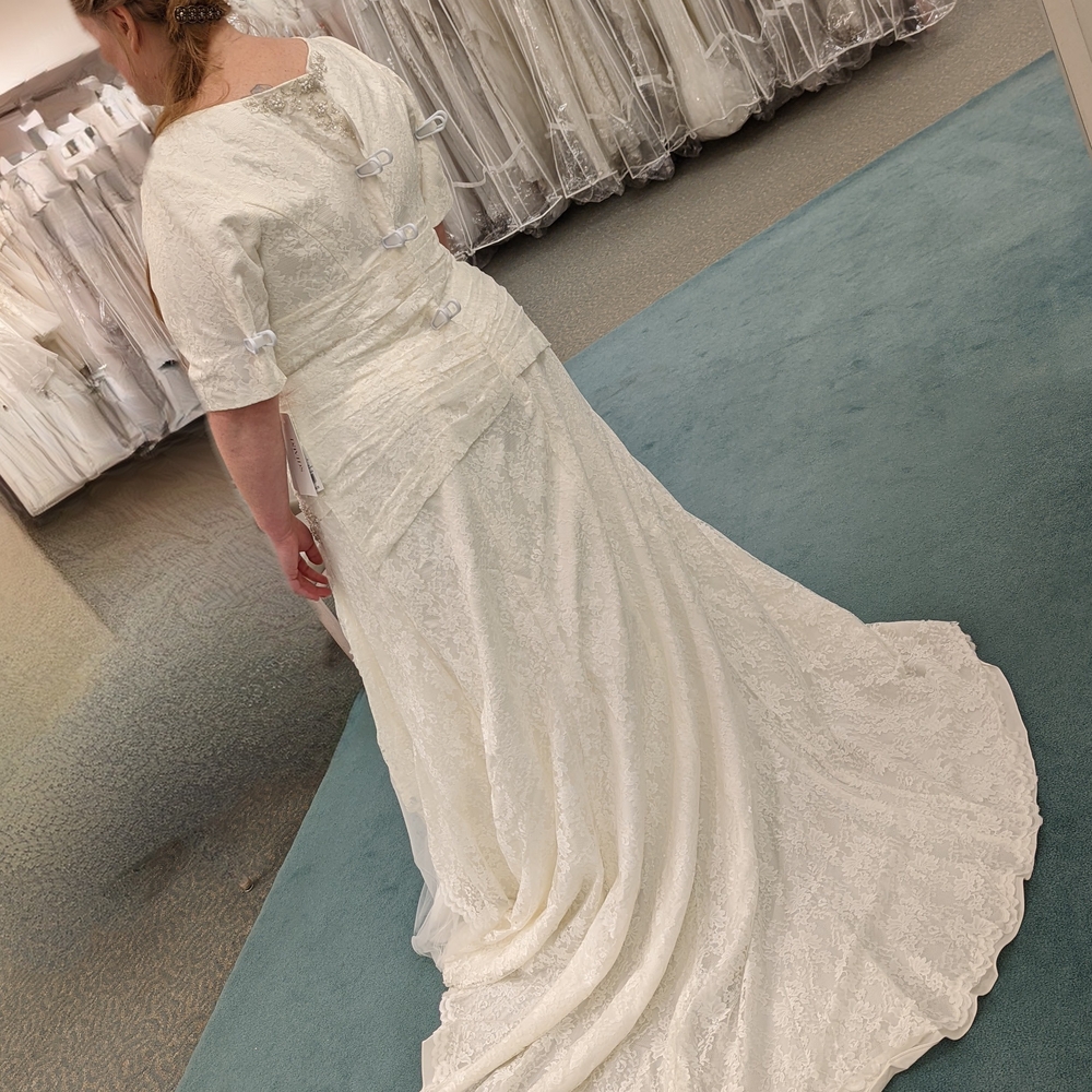 Ivory Lace Bridal Gown with Beaded Neckline